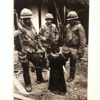 US marines tormenting an old Vietnamese civilian, the battle for the city of Hu