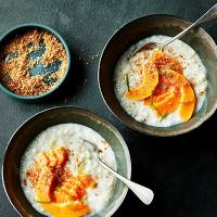 Coconut rice pudding with papaya and lime