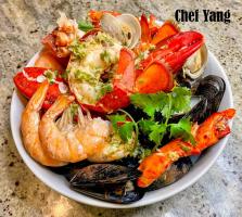 Oceanic Delight: Steamed Seafood Medley with Zesty Ginger and Garlic