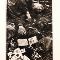A young dead North Vietanamese soldier with his possessions
