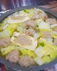 pork meatball and tofu soup with chinese cabbage