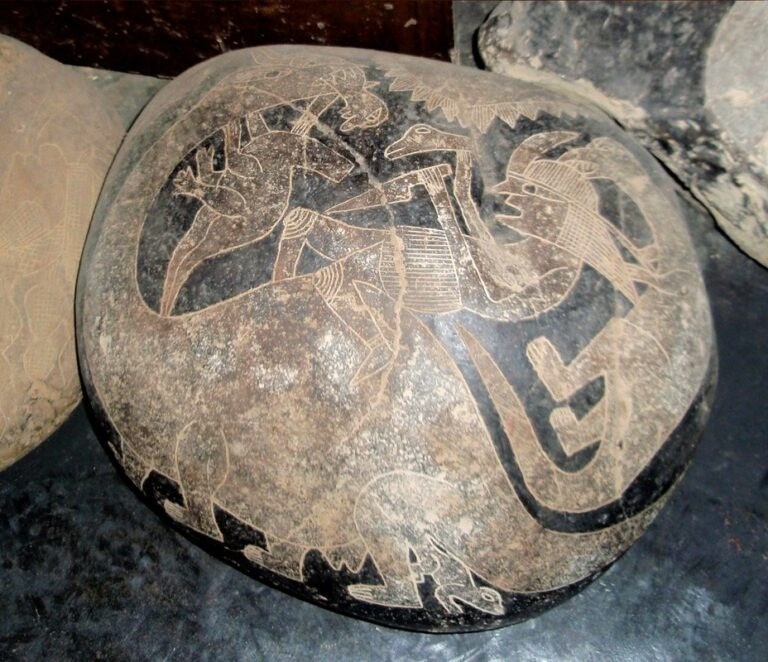 This stone shows a sauropod dinosaur with breasts giving birth to a baby, just like a mammal.