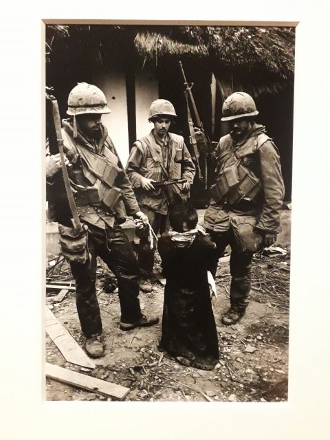 US marines tormenting an old Vietnamese civilian, the battle for the city of Hu