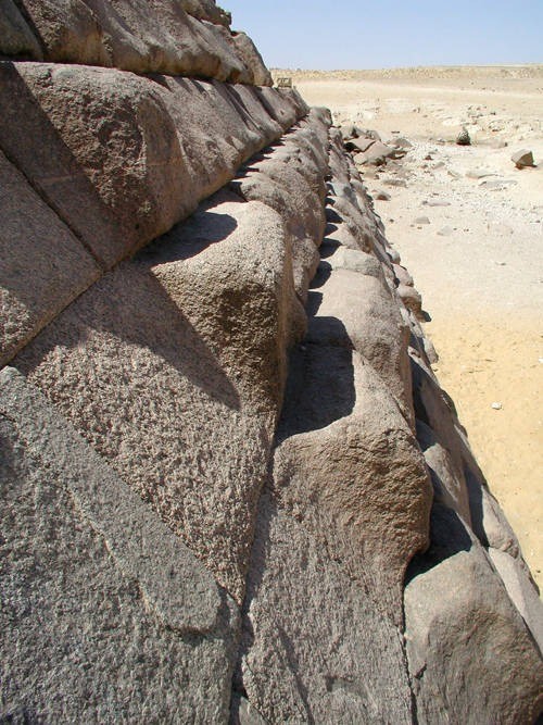 An area of unfinished casing stones on the North face of Menaure's Pyramid.