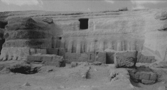 Fig. 12: The remains of the niched-façade on the eastern cut face of the tomb of Kai with Old Kingdo