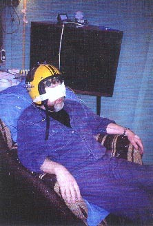 Paul Devereux experiences mind-altering effects with the magnetic helmet in Michael Persinger's labo