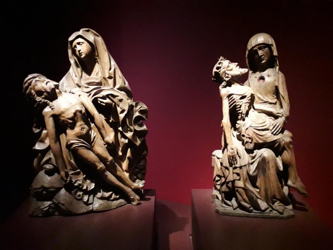 Two different interpretations of the Pietà from Michelangelo.