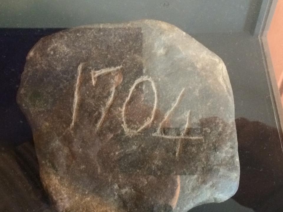 Stone with carved 1704