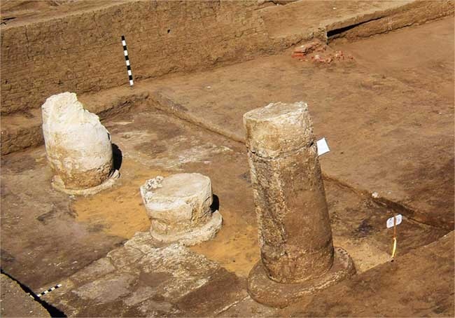 The remains of the three columns still in situ, photo by Ministry of Tourism and Antiquities of Egyp