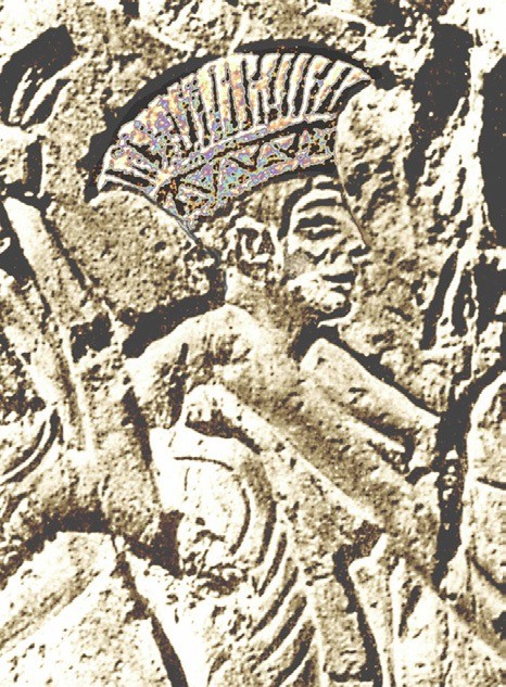 Warrior with a feathered headdress, from the cycle of bas-reliefs showing the invasion of the sea pe