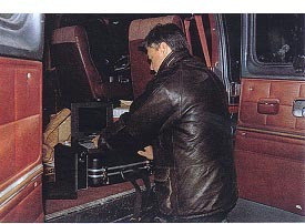 Physicist Hal Puthoff works with computerised equipment during a night observation session in the de