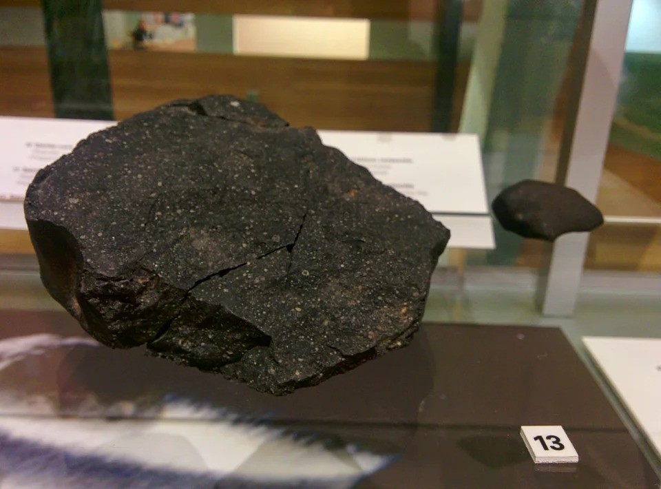 Fragment of the Murchison Meteorite which landed in Australia in 1969. It has beed dated about 4.9 b