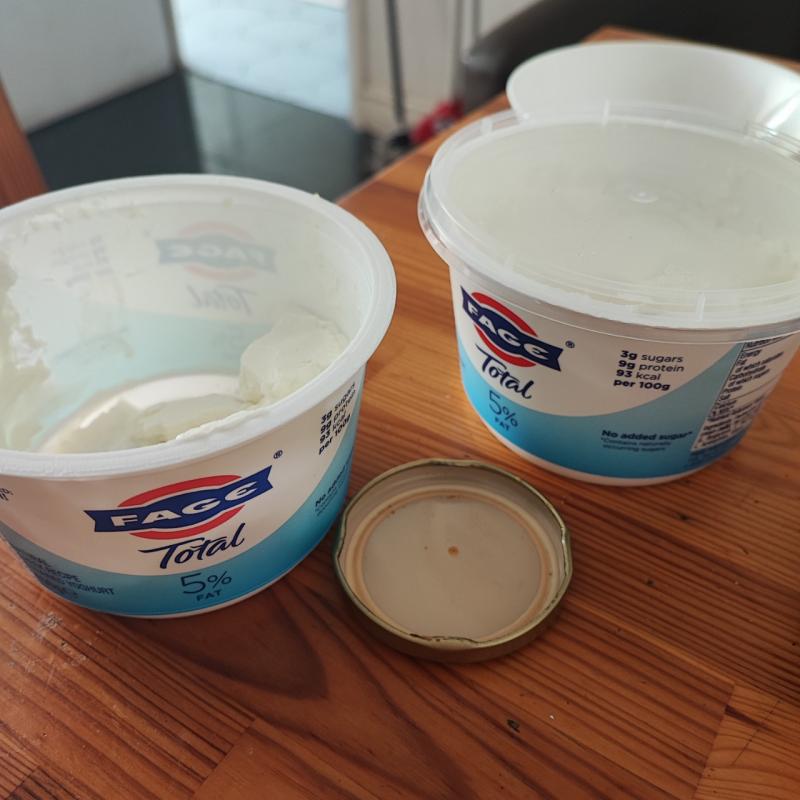 The double yogurt in the table without realizing it