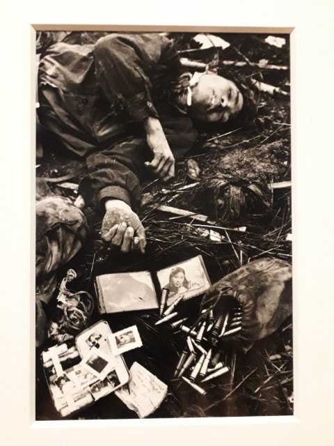 A young dead North Vietanamese soldier with his possessions