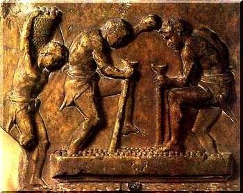 Etruscan slaves pounding grapes
