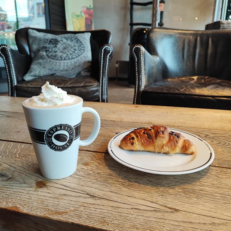 Caramel latte and chocolate croissant