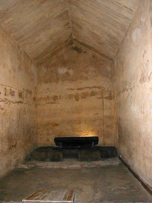 The Burial Chamber of Khafre's Pyramid is carved from the bedrock with limestone slabs forming a