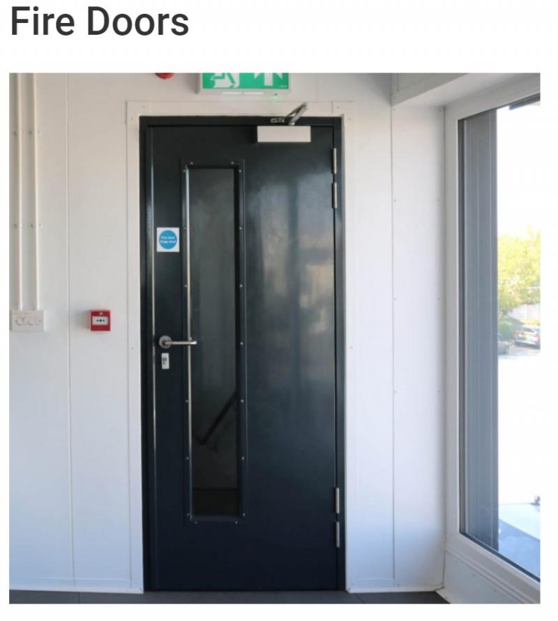 What is the difference between a fire door and a fire exit?