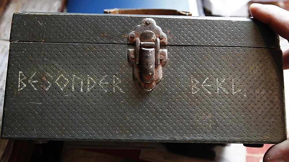 The suitcase found in the Kharakhora massif. A mystery is the name written on the side of the box. T