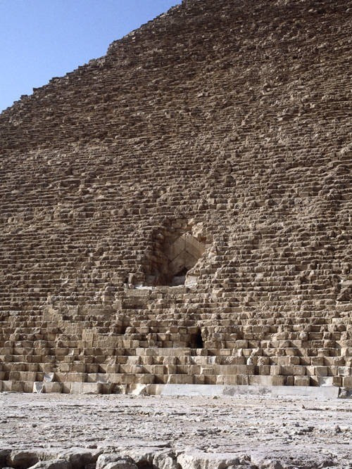The North face of the Great Pyramid with the small entrance made by Caliph al-Mamum below the origin