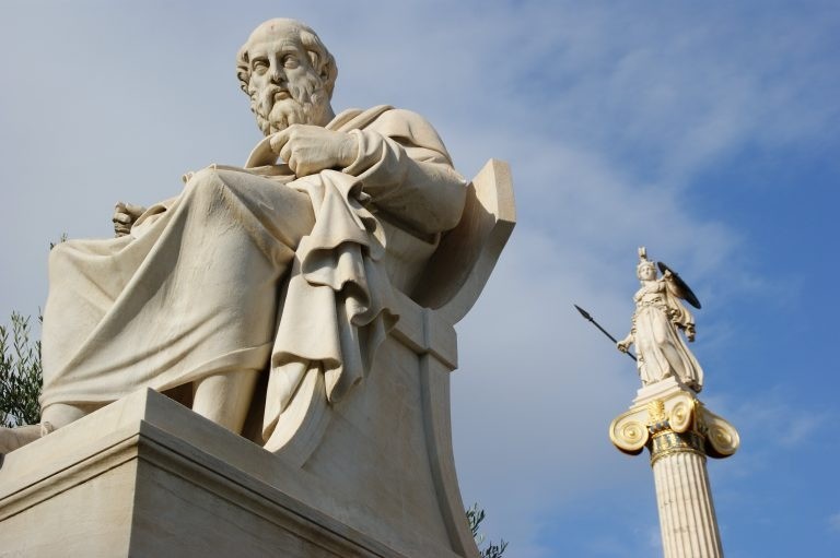 Statue of Plato (and behind him, Athena) at the National Academy of Athens.