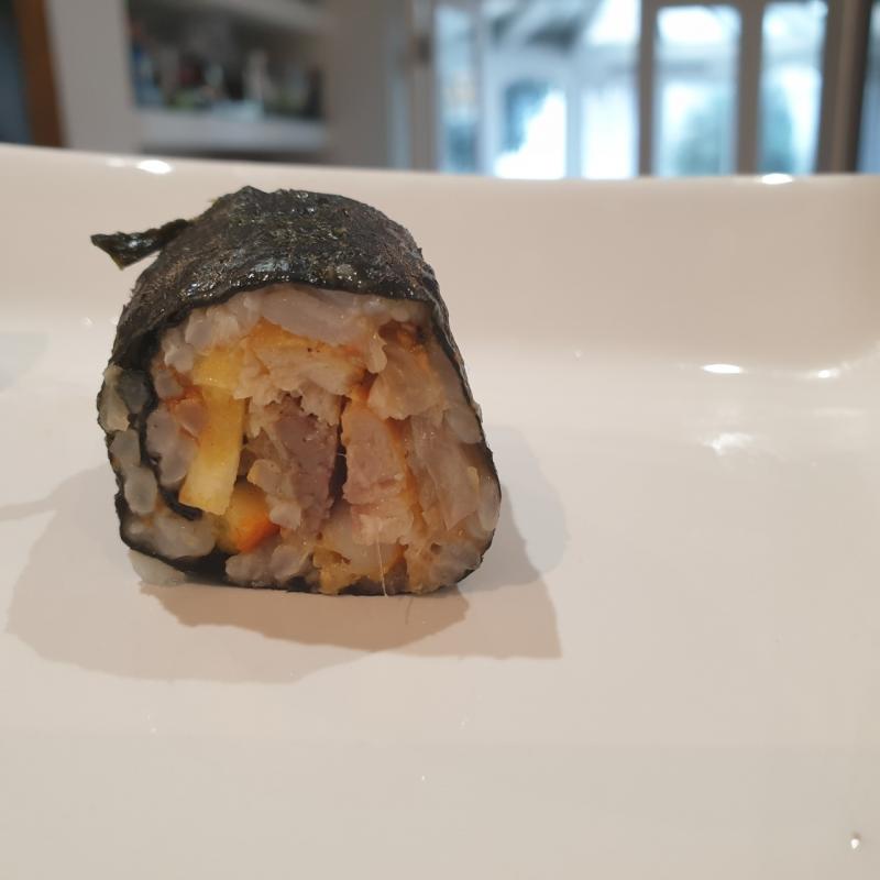 Sushi orange, shallots and herring