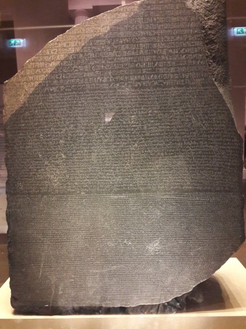 The Rosetta Stone at the British museum in London, engraved with three different types of writing, w