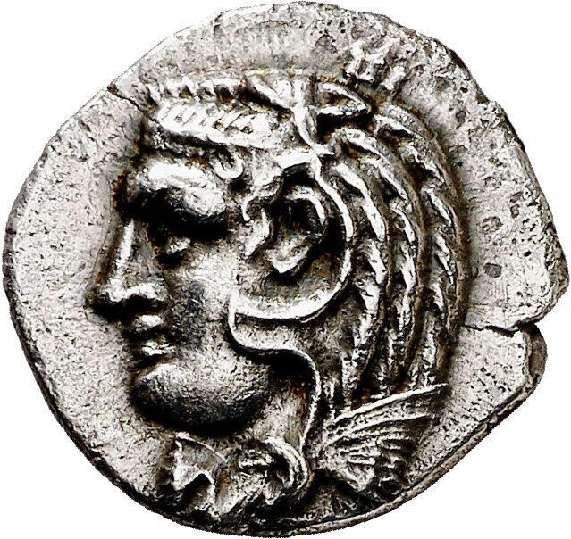 Melqart, the Phoenician Heracles, depicted on a coin from Cadiz. Note the lion skin.